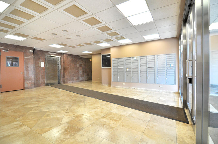 Lobby mail area and elevator hall at The Olmstead
